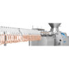 accrochage-rhs-330-2 Photo détail ligne accrochage saucisse RHS 330 REX TECHNOLOGIE